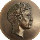 Portrait en médaillon en bronze