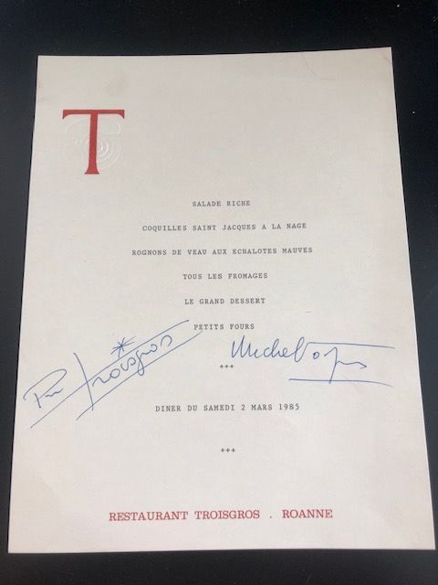 Menu dédicacé par les deux frères Troigros (Jean et Pierre) daté du samedi 2 mars 1985.