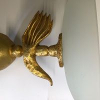 Bronze doré à décor stylisé portant une coupe, signé par Pierre CASENOVE. Travail français. Très bon état. 29 en hauteur,36 en longueur et 17 de largeur. Pèse 8.1kg.